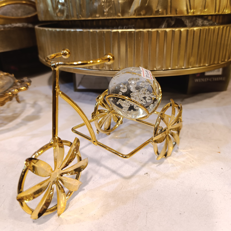 Cute Metal cycle holding Glass Ball