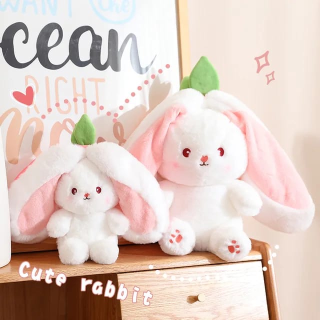 Reversible pink Strawberry Floppy Ear Bunny stuffed toy with zipper.